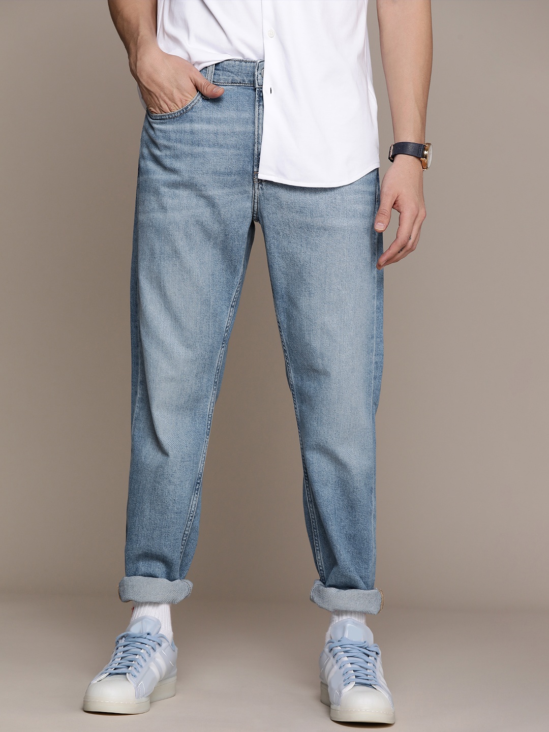 

Calvin Klein Jeans Men Blue Tapered Fit Heavy Fade Stretchable Jeans