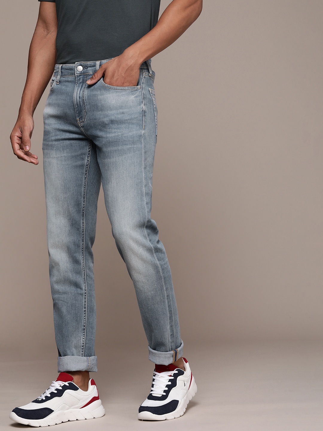 

Calvin Klein Jeans Men Tapered Fit Heavy Fade Stretchable Jeans, Blue