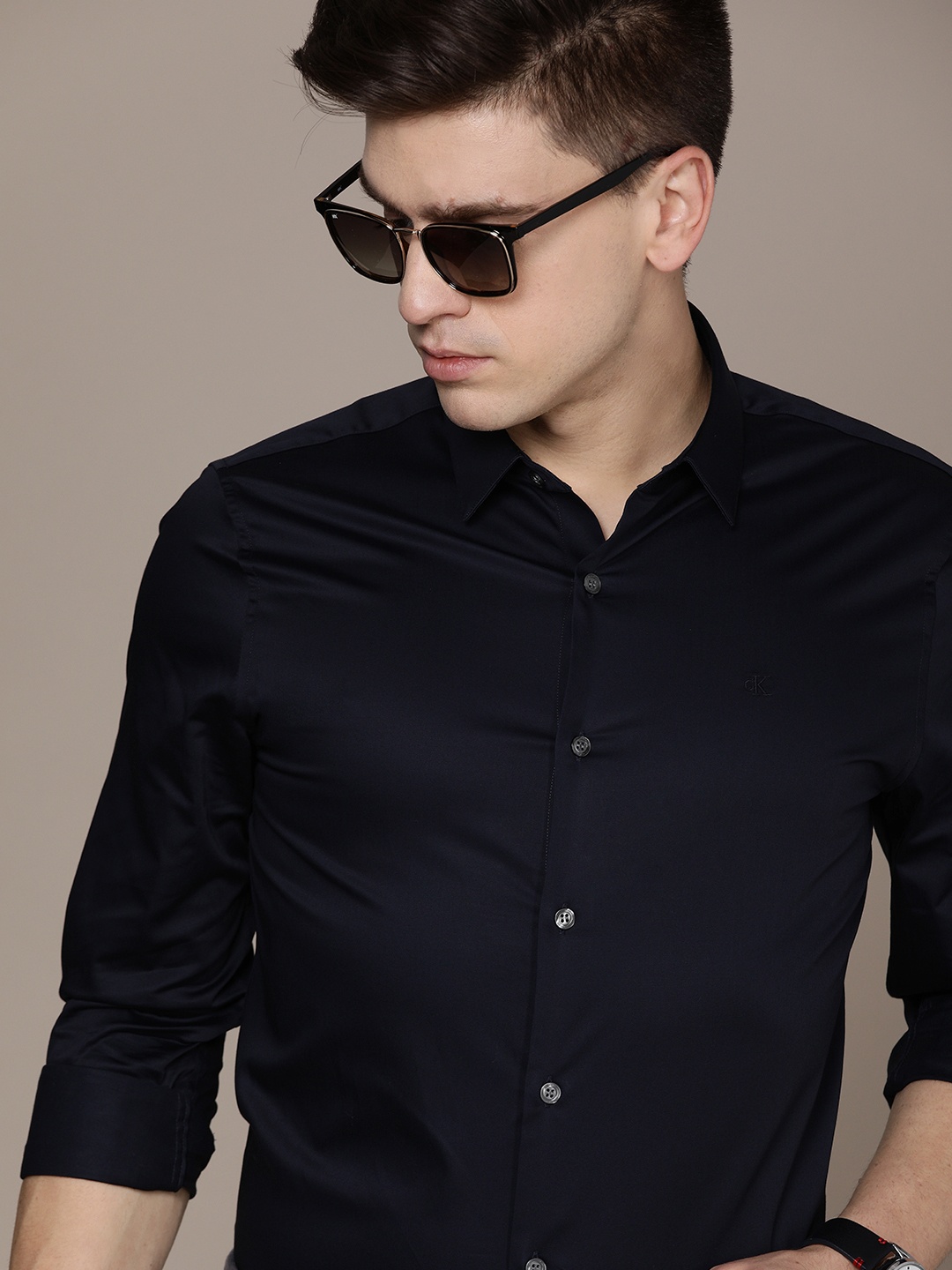 

Calvin Klein Jeans Men Navy Blue Solid Slim Fit Semi-Formal Shirt