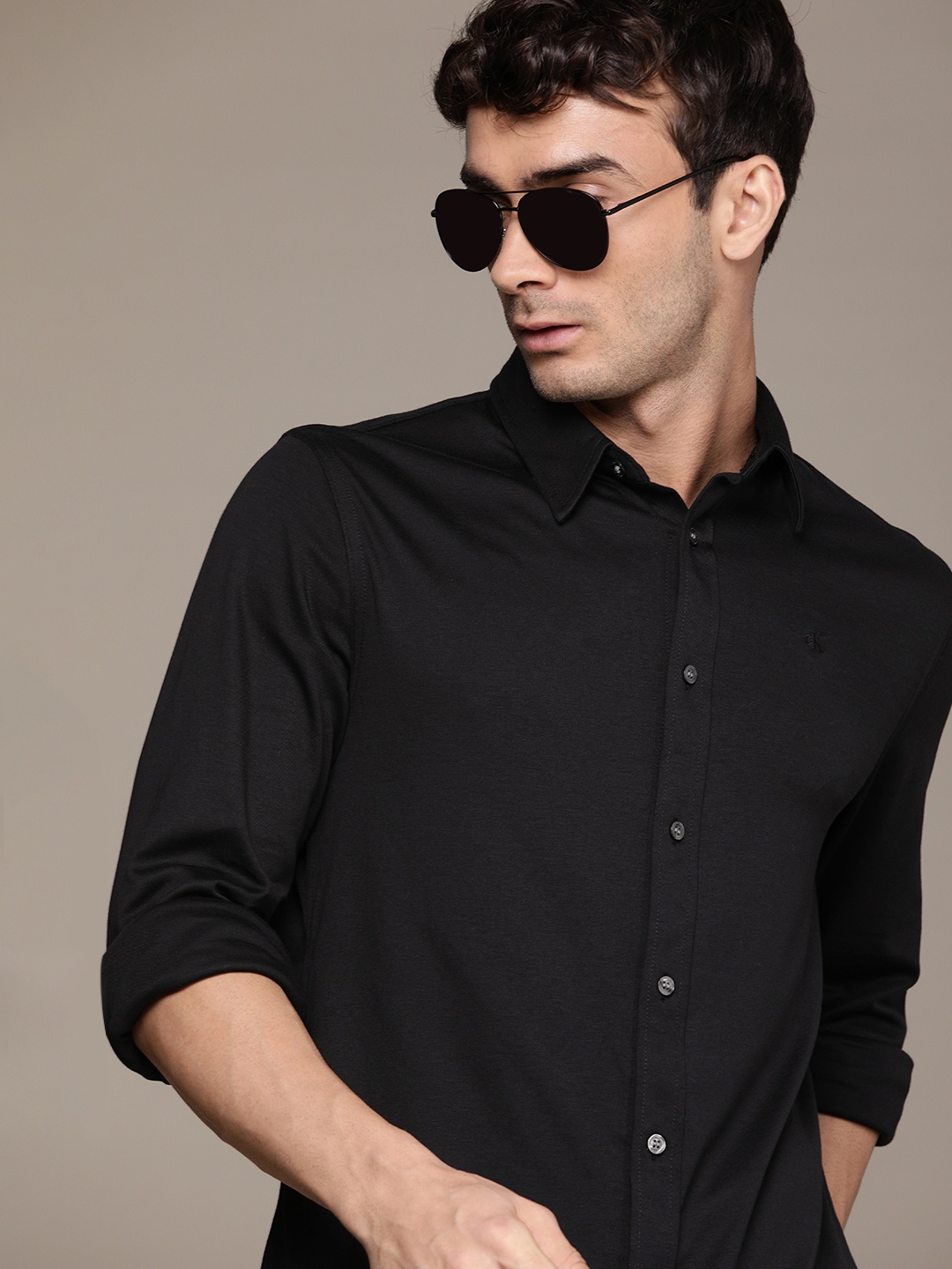 

Calvin Klein Jeans Men Black Solid Slim Fit Casual Shirt