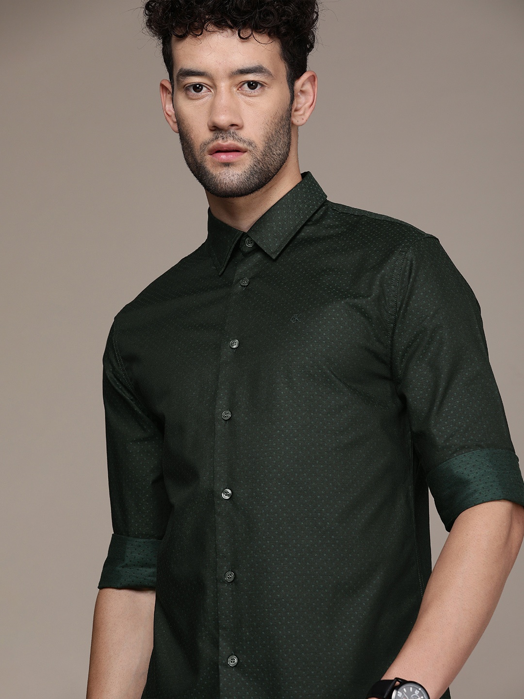 

Calvin Klein Jeans Men Olive Green Self Design Opaque Smart Casual Shirt