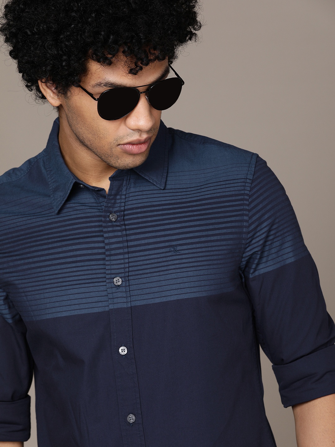 

Calvin Klein Jeans Men Navy Blue Striped Slim Fit Casual Shirt