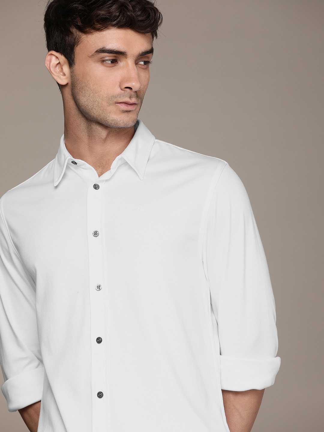 

Calvin Klein Jeans Men White Solid Slim Fit Casual Shirt