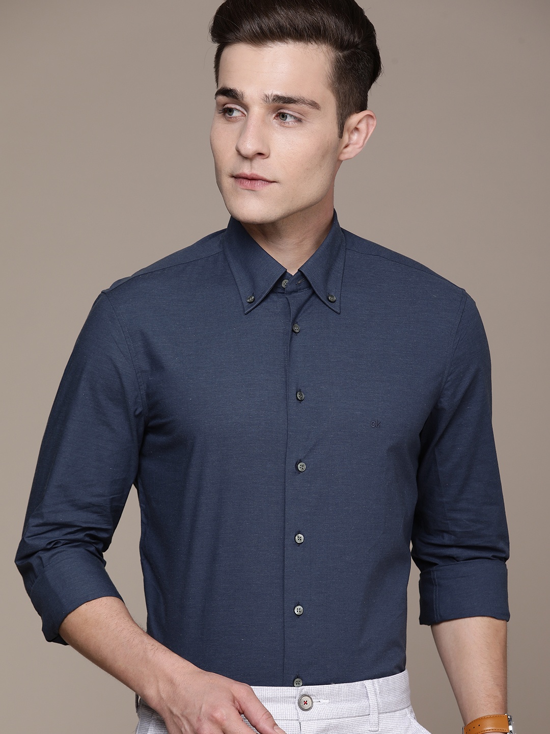 

Calvin Klein Jeans Men Blue Solid Slim Fit Pure Cotton Semiformal Shirt