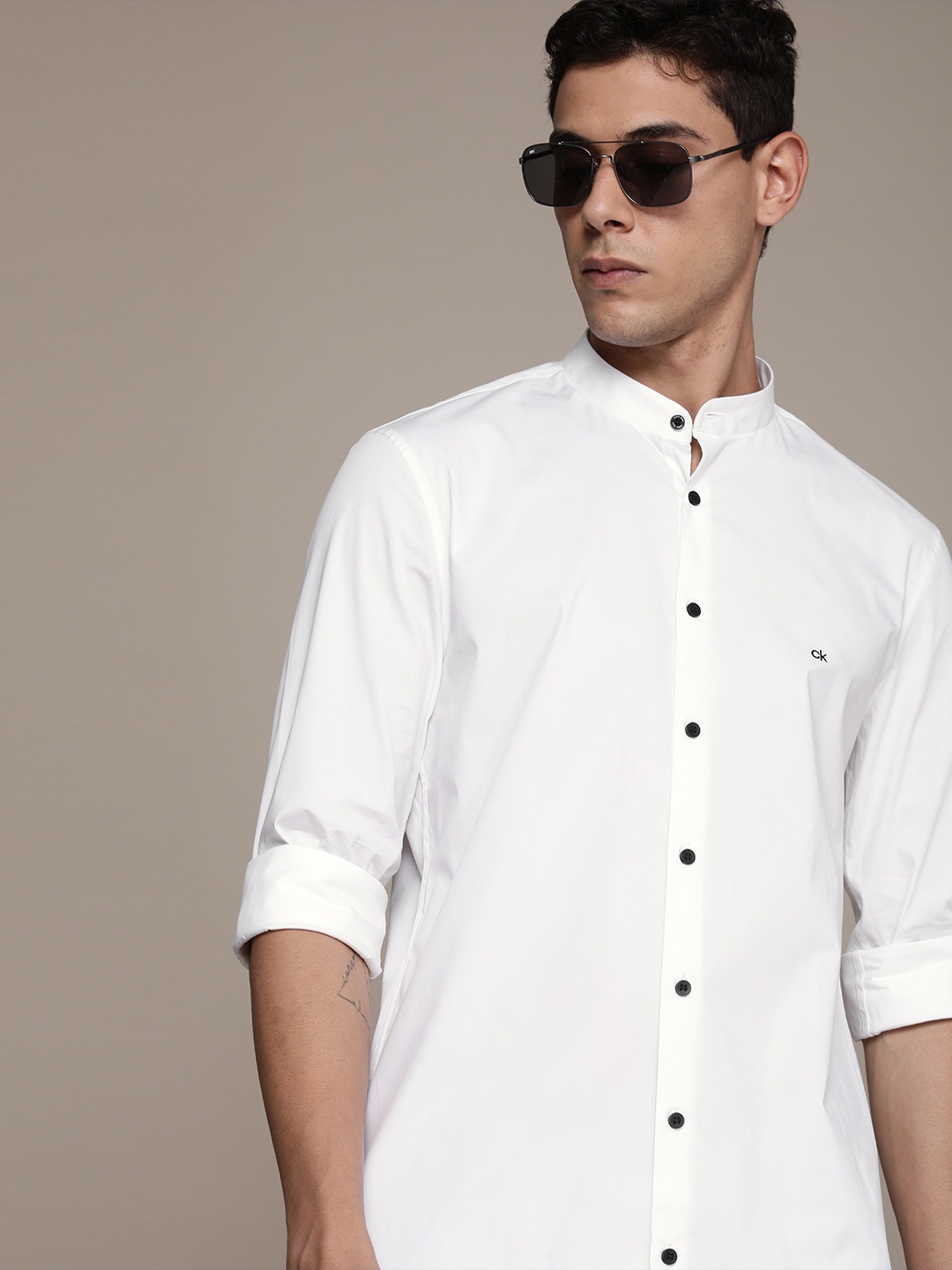 

Calvin Klein Jeans Men White Solid Slim Fit Casual Shirt