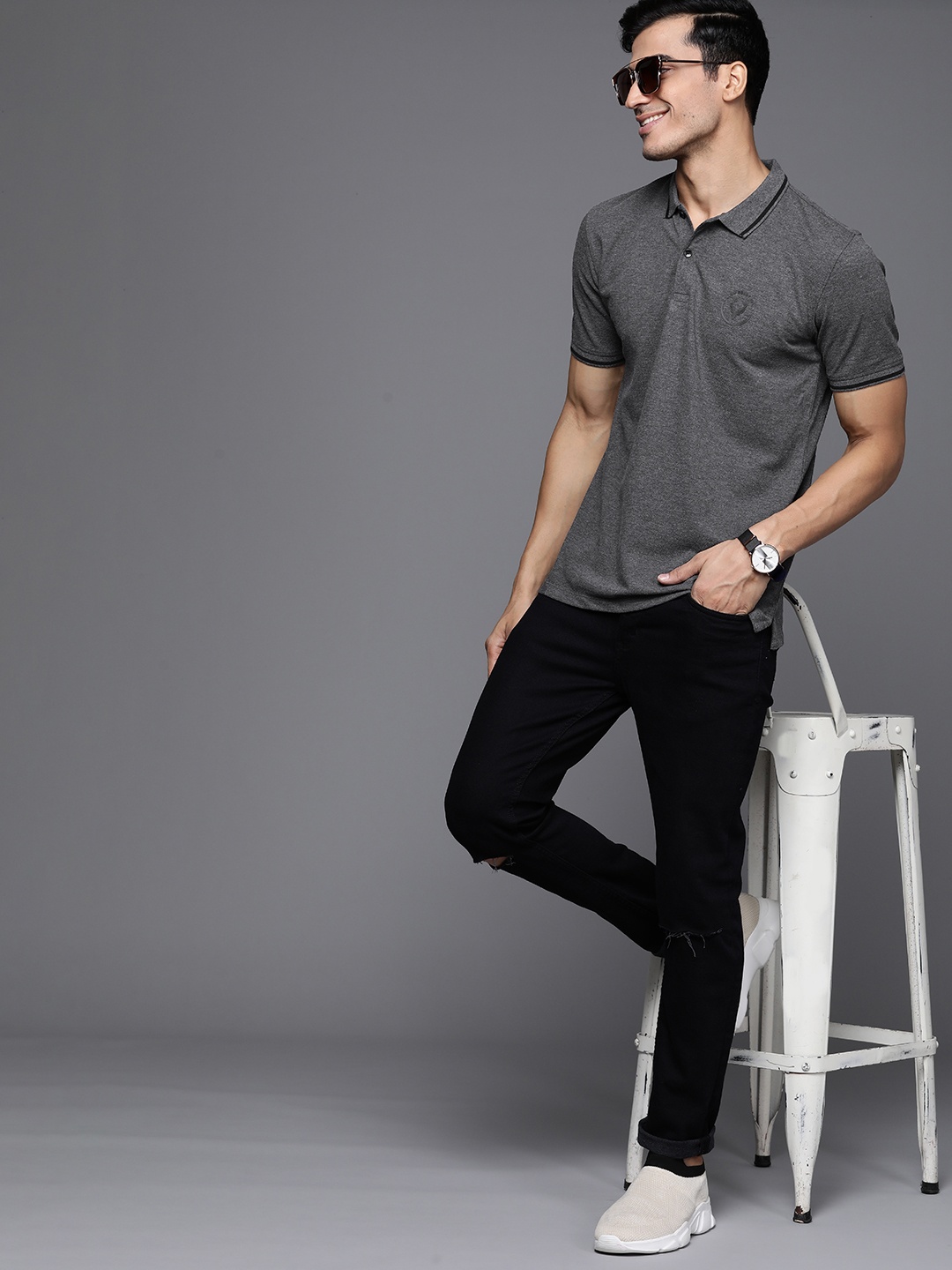 

Allen Solly Sport Men Charcoal Grey Solid Polo Collar T-shirt