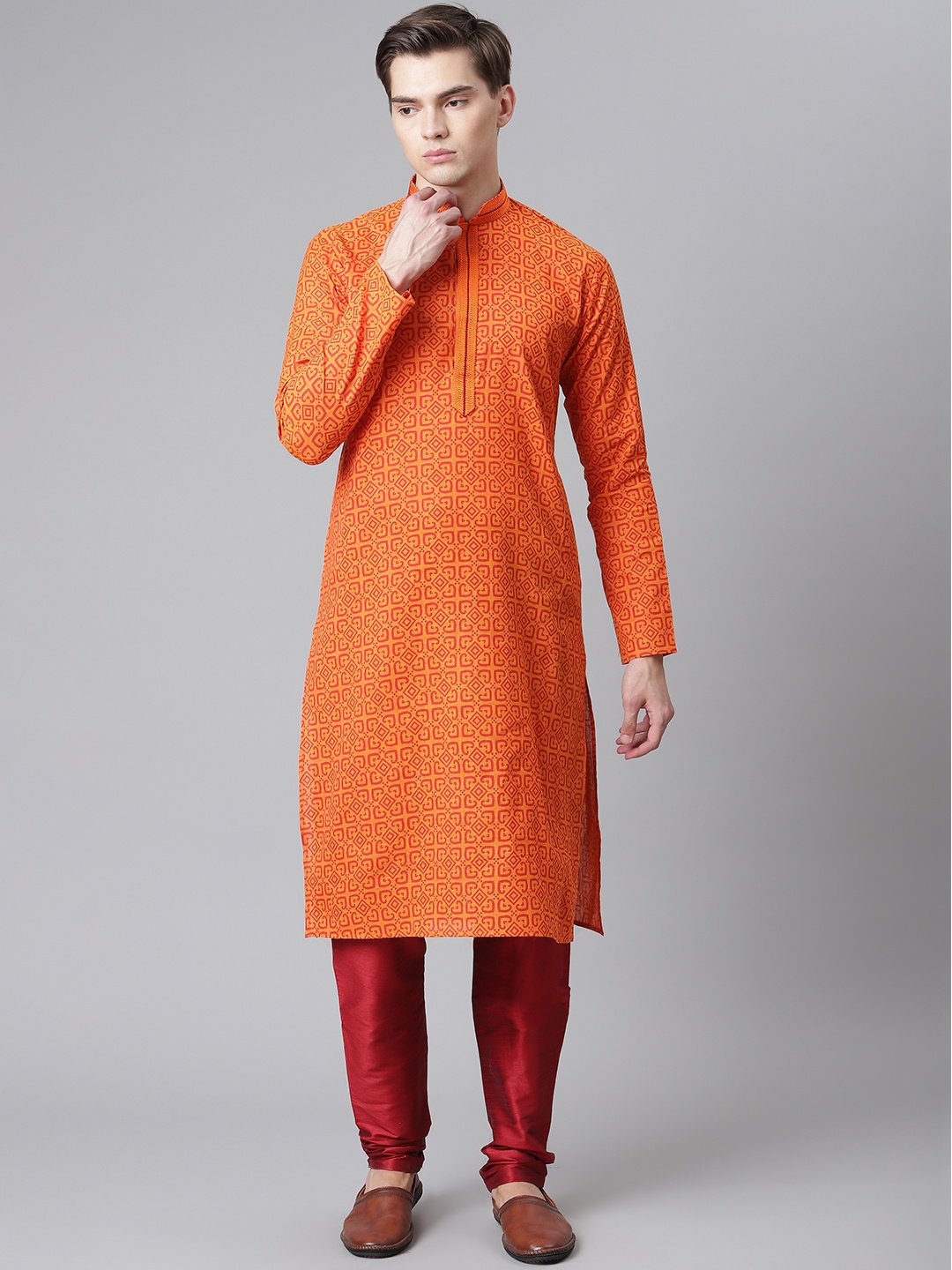 

Readiprint Fashions Men Orange Printed Thread Work Kurta with Churidar