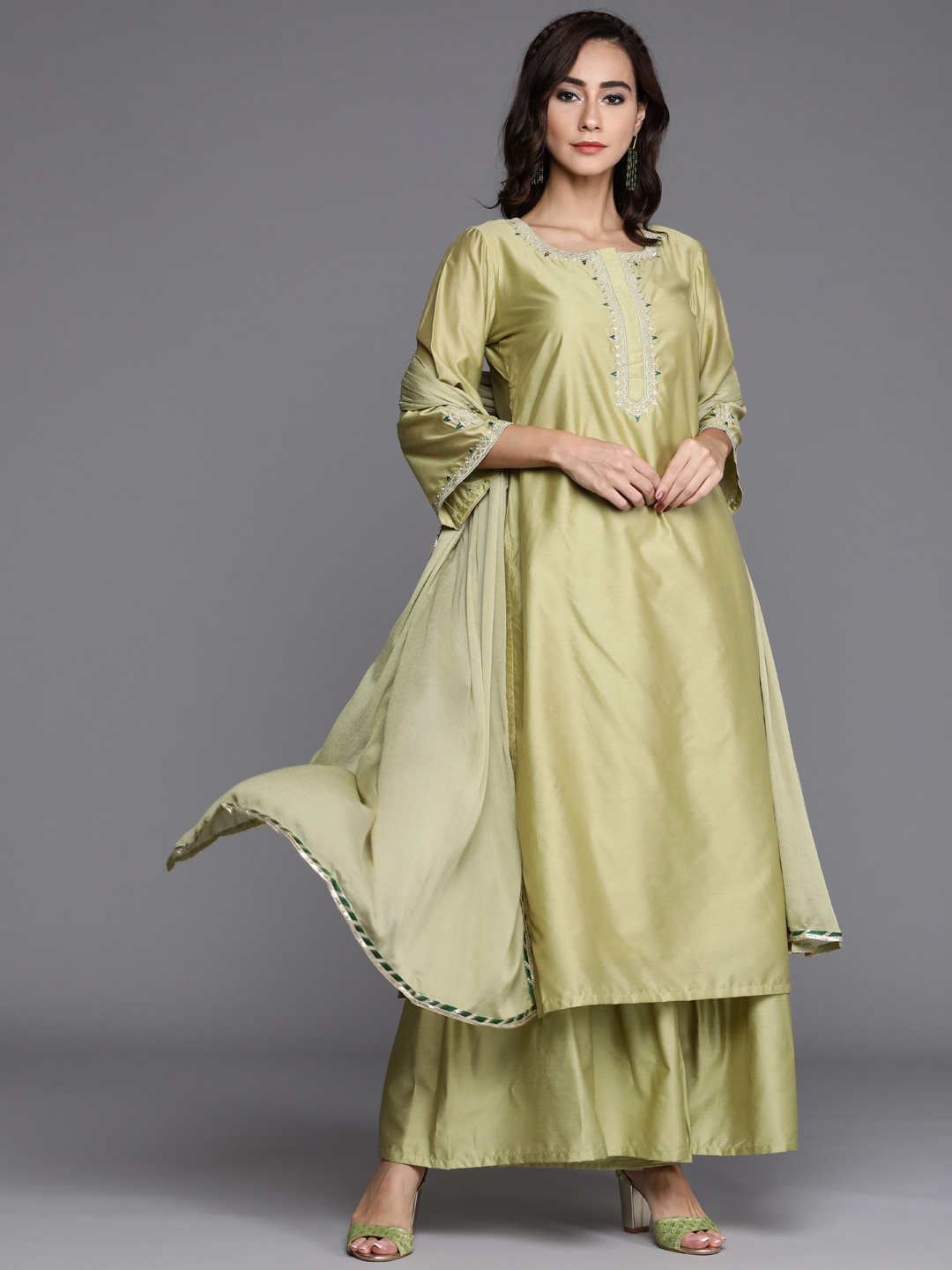 

Libas Women Green Solid Chanderi Silk Straight Kurta Sharara & Dupatta