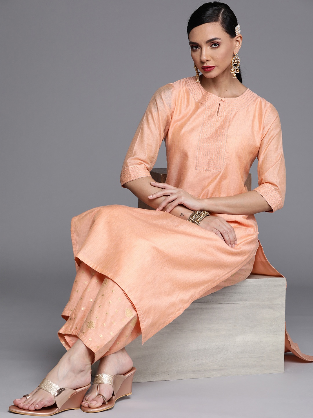 

Libas Women Peach-Coloured Ethnic Motifs Chanderi Silk Kurta with Palazzos