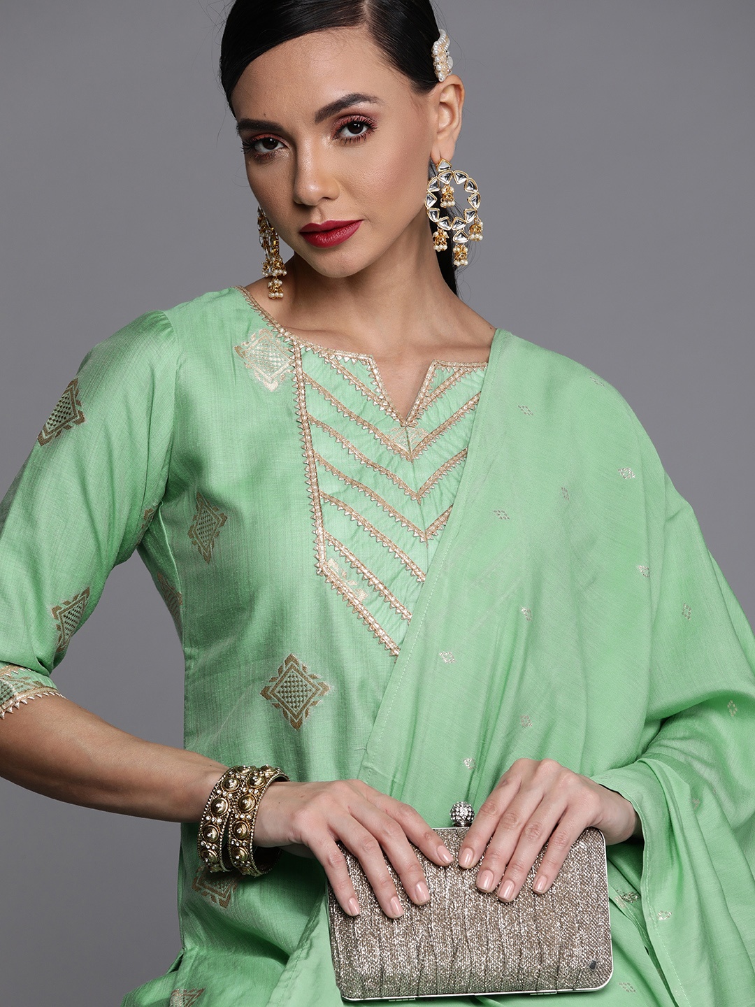 

Libas Women Green & Golden Chanderi Silk Kurta with Palazzos & With Dupatta