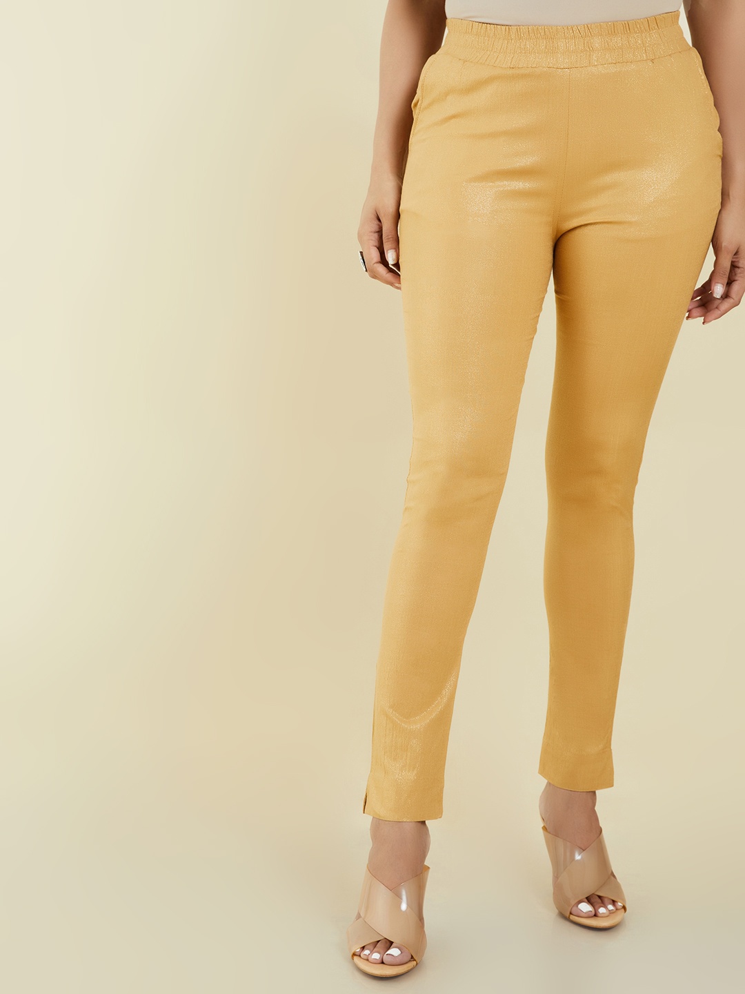 

Soch Women Gold-Toned Solid Regular Trousers