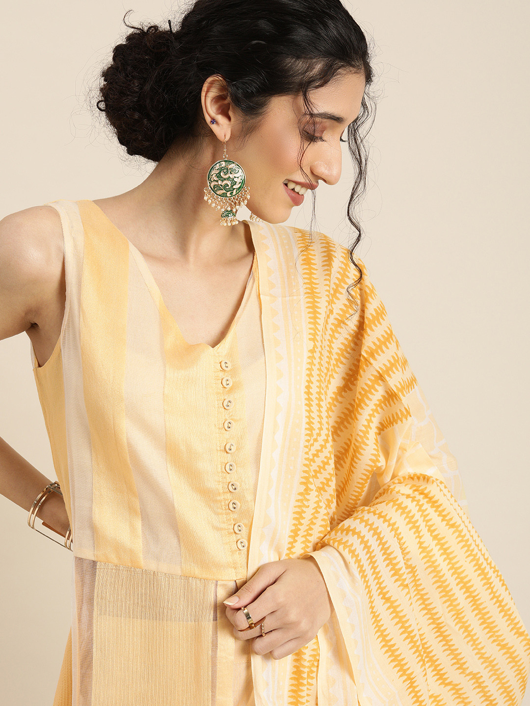 

Taavi Women Yellow Regular Pure Cotton Woven Legacy A-Line Sustainable Kurta Set