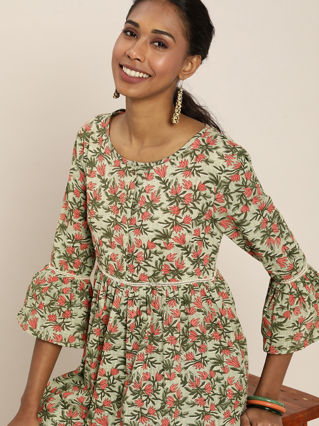 

Taavi Off White & Green Floral Bagru Handblock Print Bell Sleeved Gathered Tunic