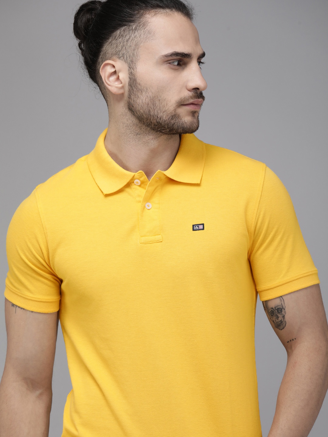 

Arrow Men Yellow Polo Collar T-shirt