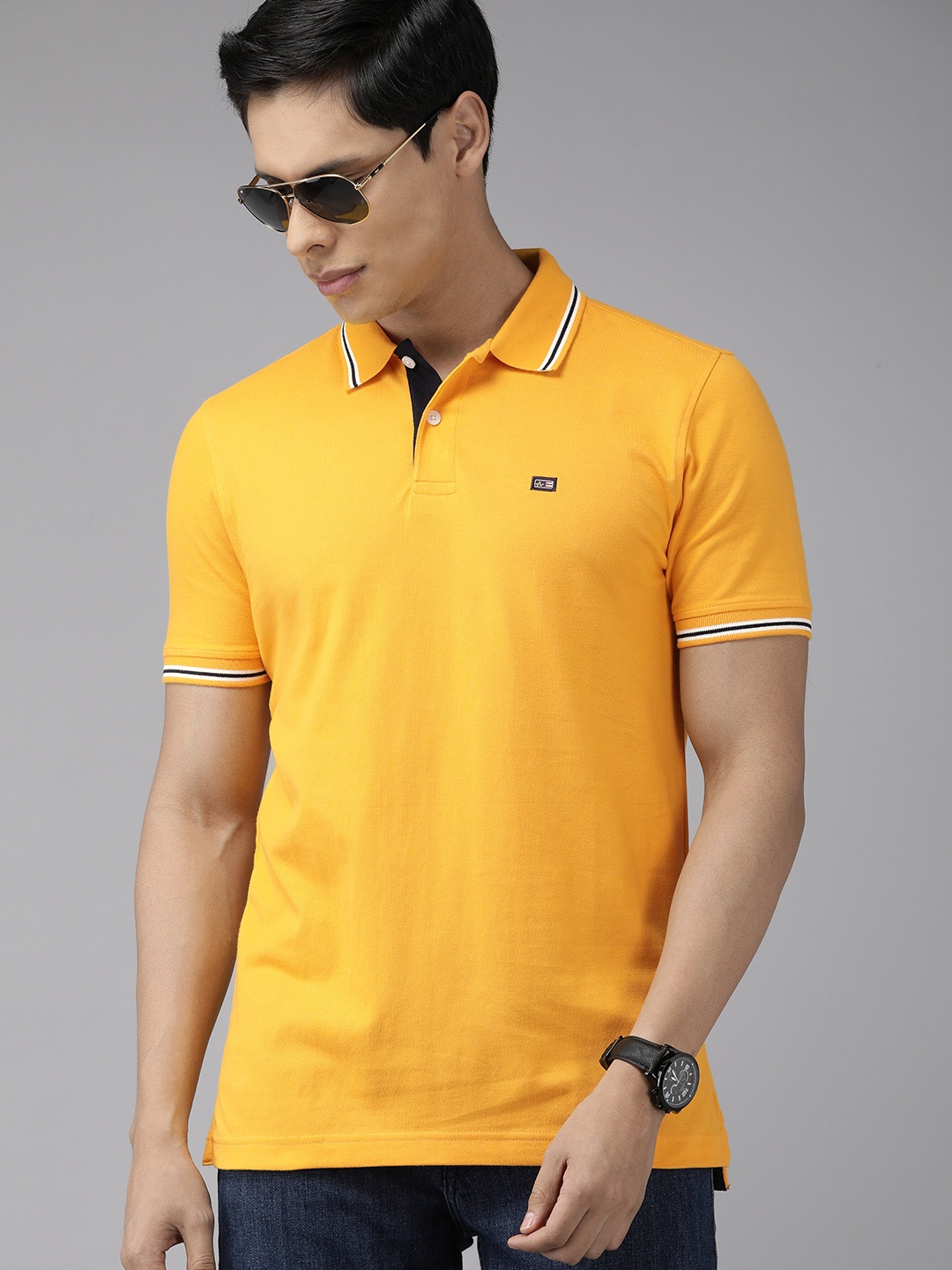 

Arrow Men Yellow Solid Polo Collar Pure Compact Cotton Pure Cotton T-shirt