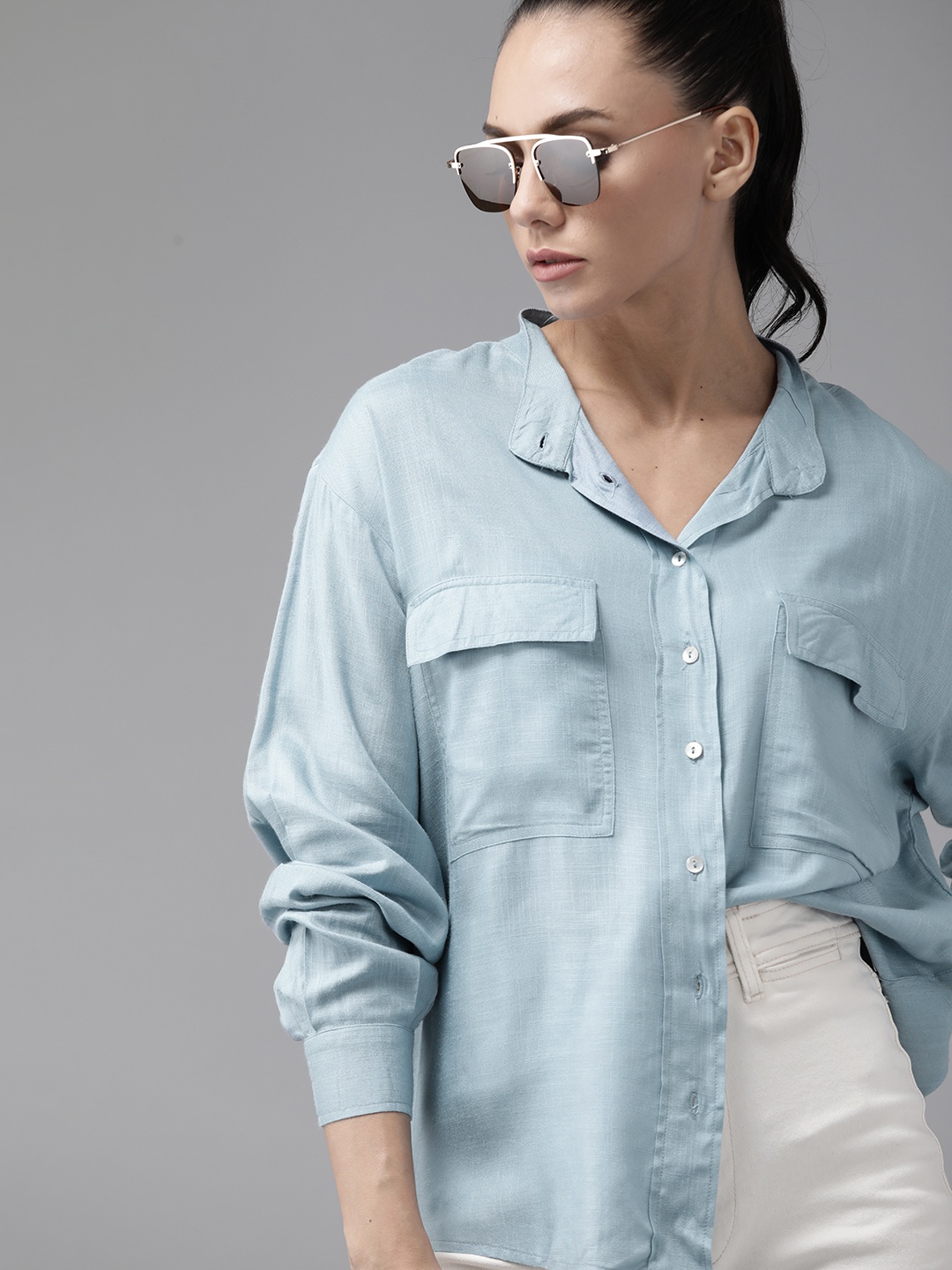 

Roadster Women Blue Solid Casual Shirt