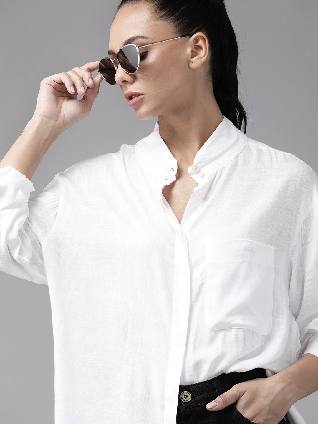 

Roadster Women White Solid Casual Shirt