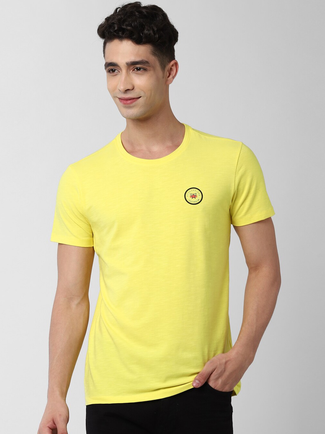 

Peter England Casuals Men Yellow Applique Slim Fit T-shirt