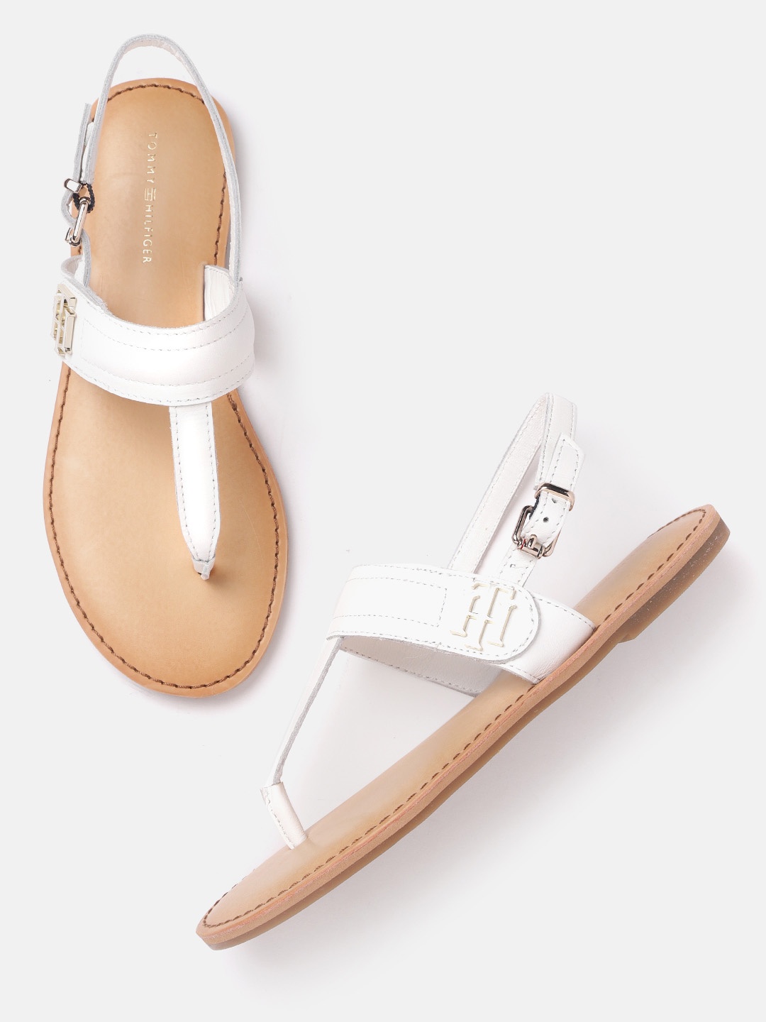 

Tommy Hilfiger Women White Leather Solid T-Strap Flats
