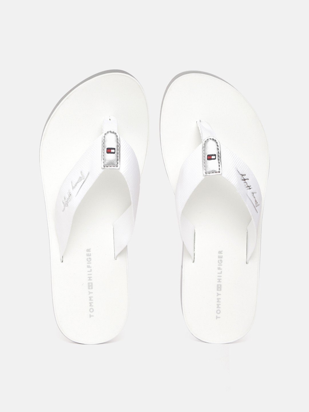 

Tommy Hilfiger Women White Thong Flip-Flops