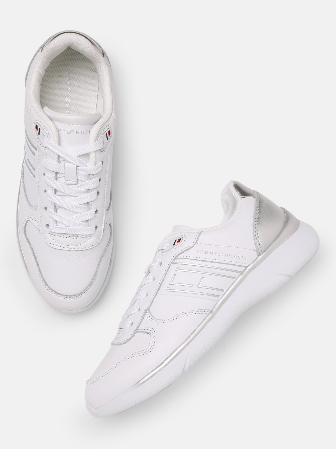 

Tommy Hilfiger Women White & Silver-Toned Solid LIGHTWEIGHT Leather Sneakers