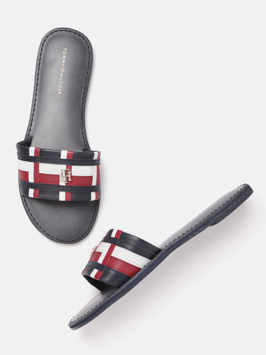 

Tommy Hilfiger Women Navy Blue & White Striped Leather Open Toe Flats