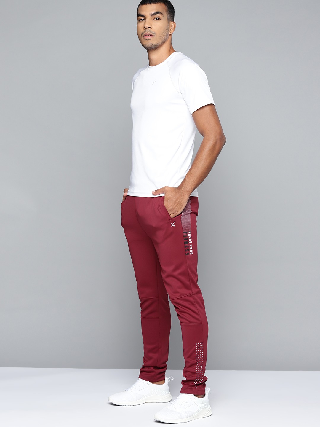 

HRX By Hrithik Roshan Men Rust Red Typographic Slim Fit Rapid-Dry Training Track Pants