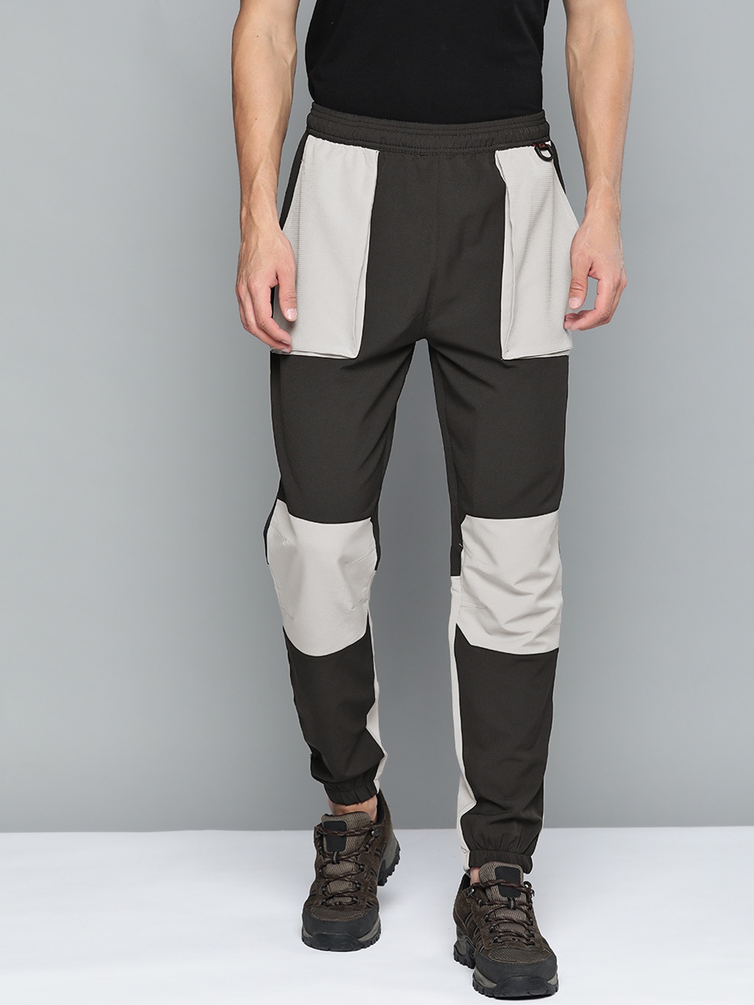 

HRX By Hrithik Roshan Outdoor Men Wet Weather Lycra Colourblock Track Pants, Black
