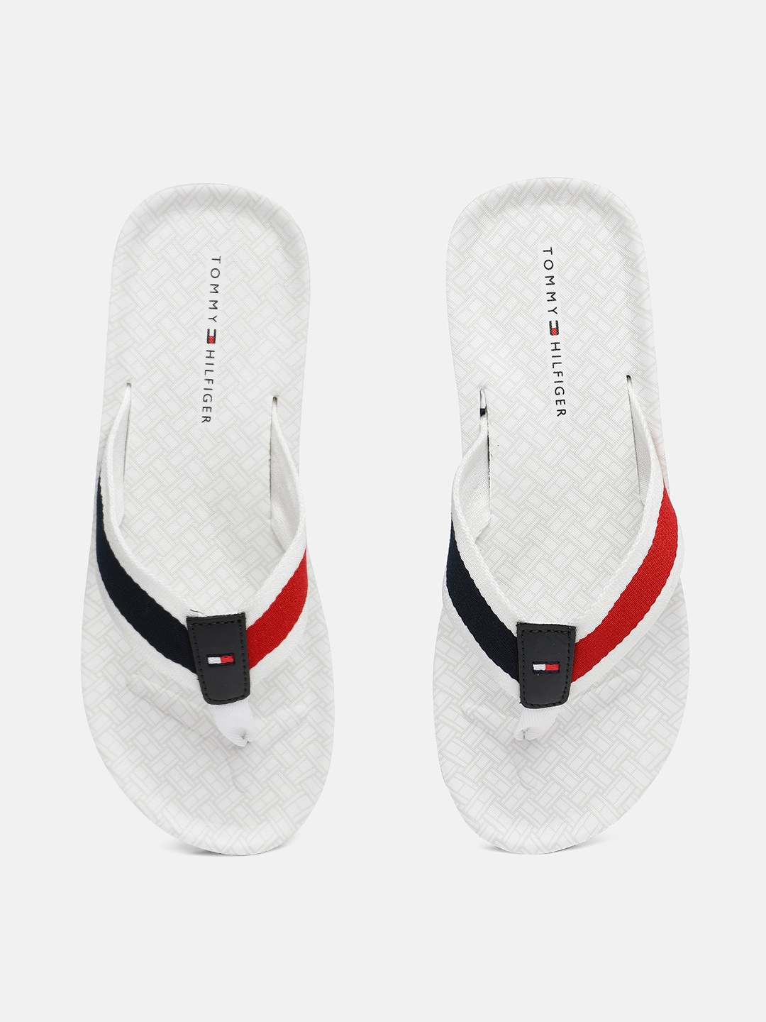 

Tommy Hilfiger Men White & Navy Blue Printed Slip-Ons