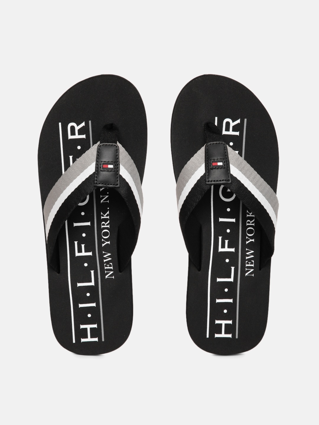 

Tommy Hilfiger Men Black & White Colourblocked Slip-On