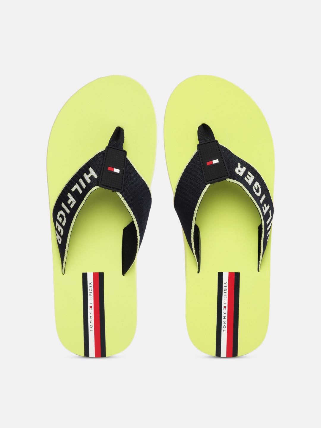 

Tommy Hilfiger Men Black & Yellow Solid Flip Flops