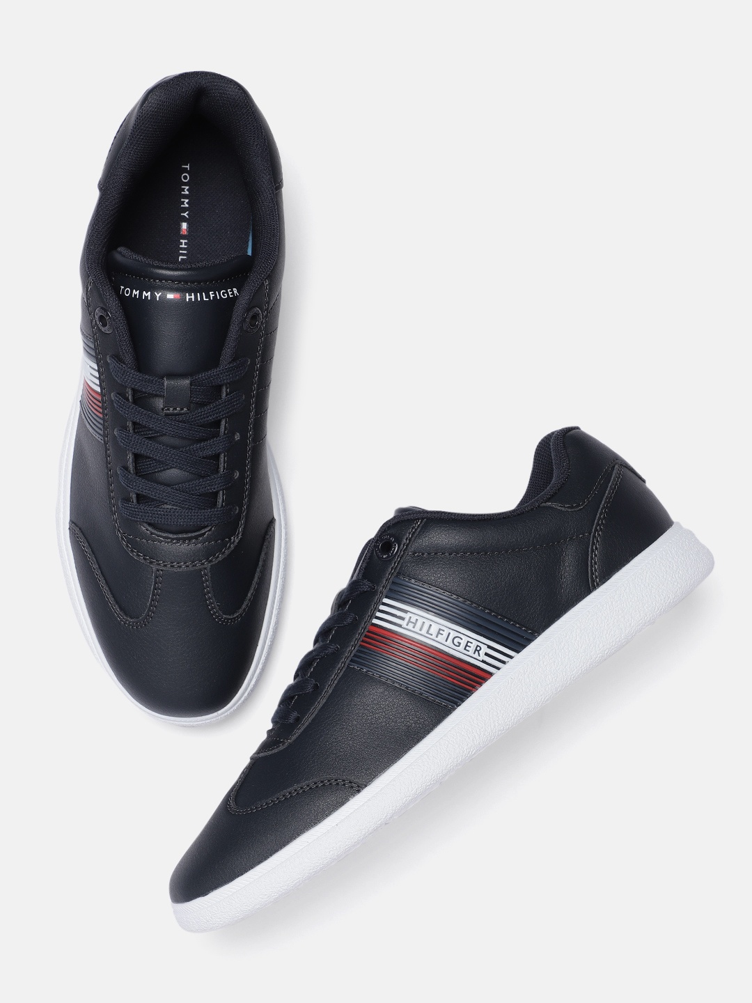 

Tommy Hilfiger Men Navy Blue Solid Leather Sneakers