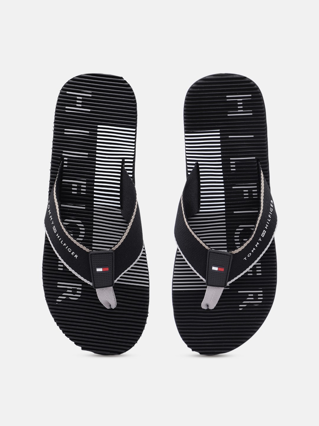 

Tommy Hilfiger Men Black Printed Slip-On