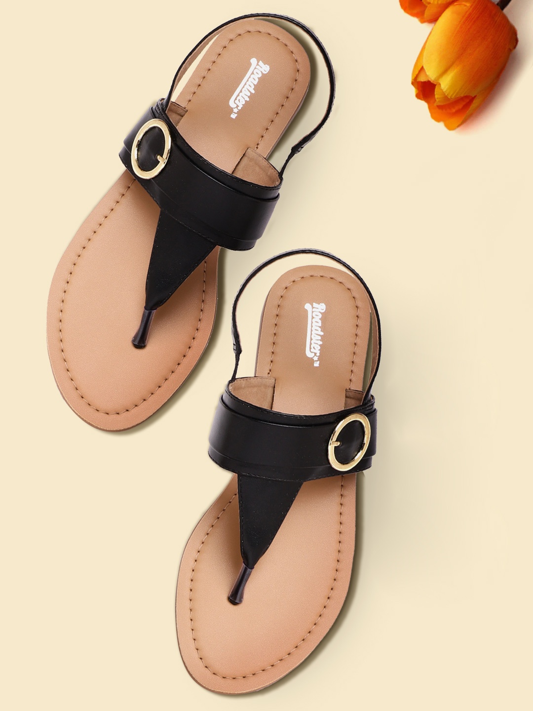 

Roadster Women Black Solid T-Strap Flats with Buckle Detail