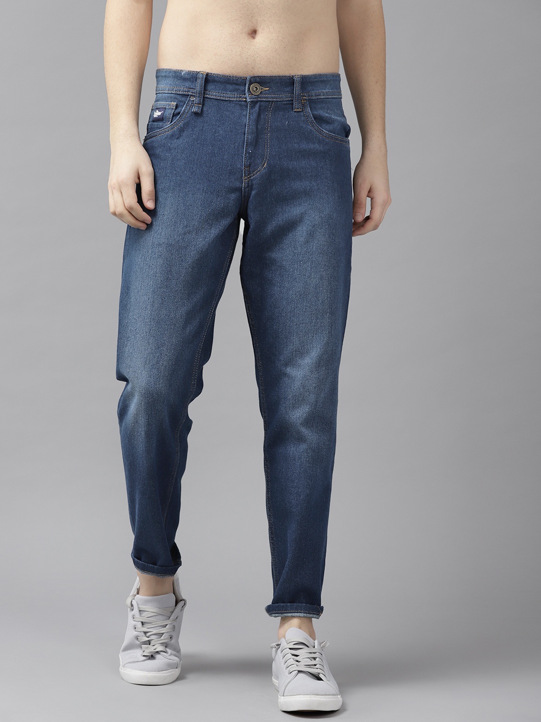 

Roadster Men Navy Blue Carrot Fit Light Fade Stretchable Jeans