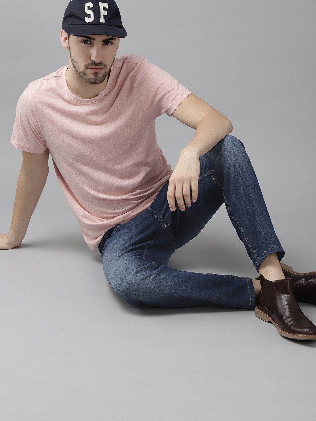 

Roadster Men Navy Blue Carrot Light Fade Stretchable Jeans