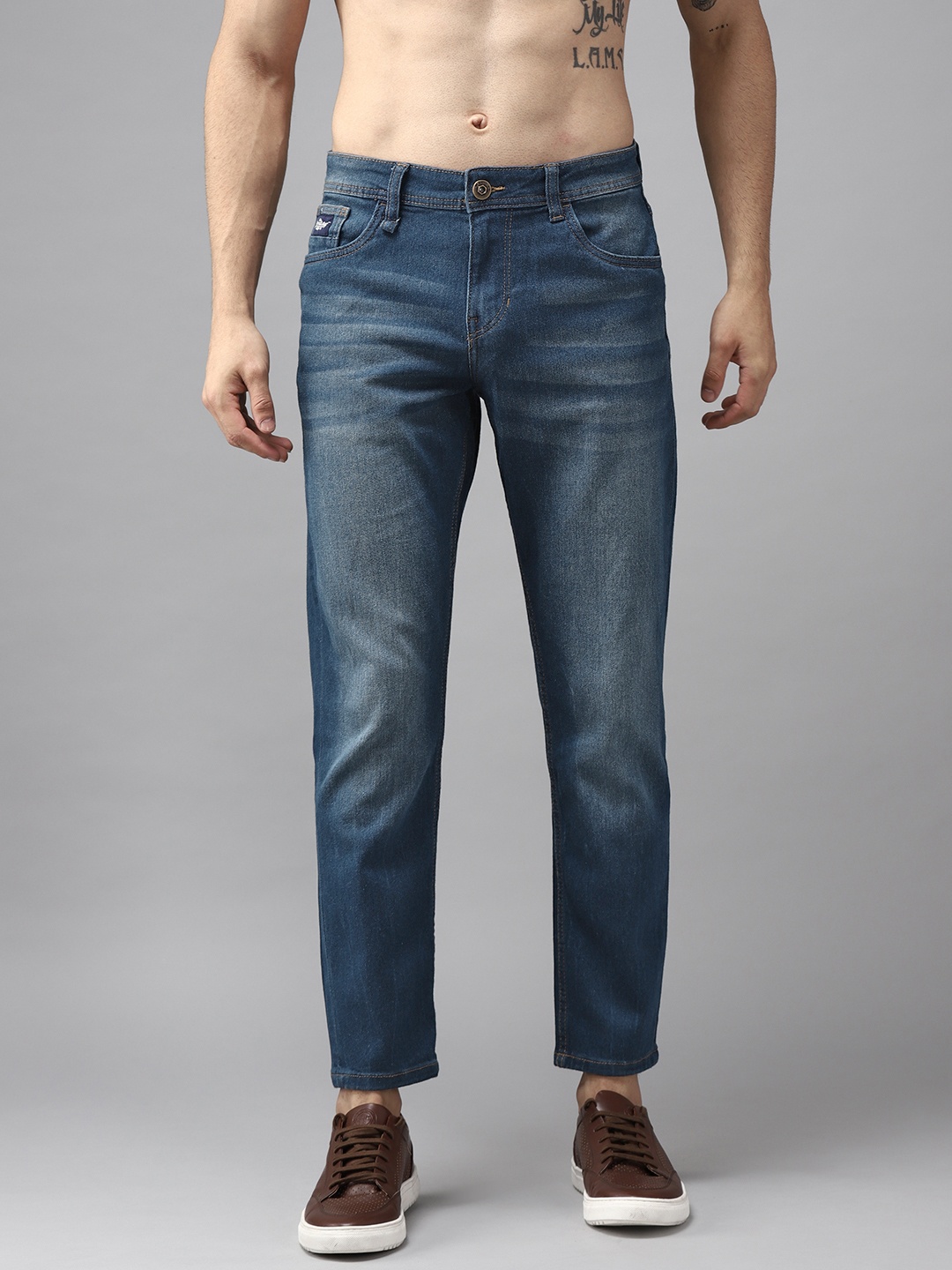 

Roadster Men Navy Blue Light Fade Carrot Stretchable Jeans