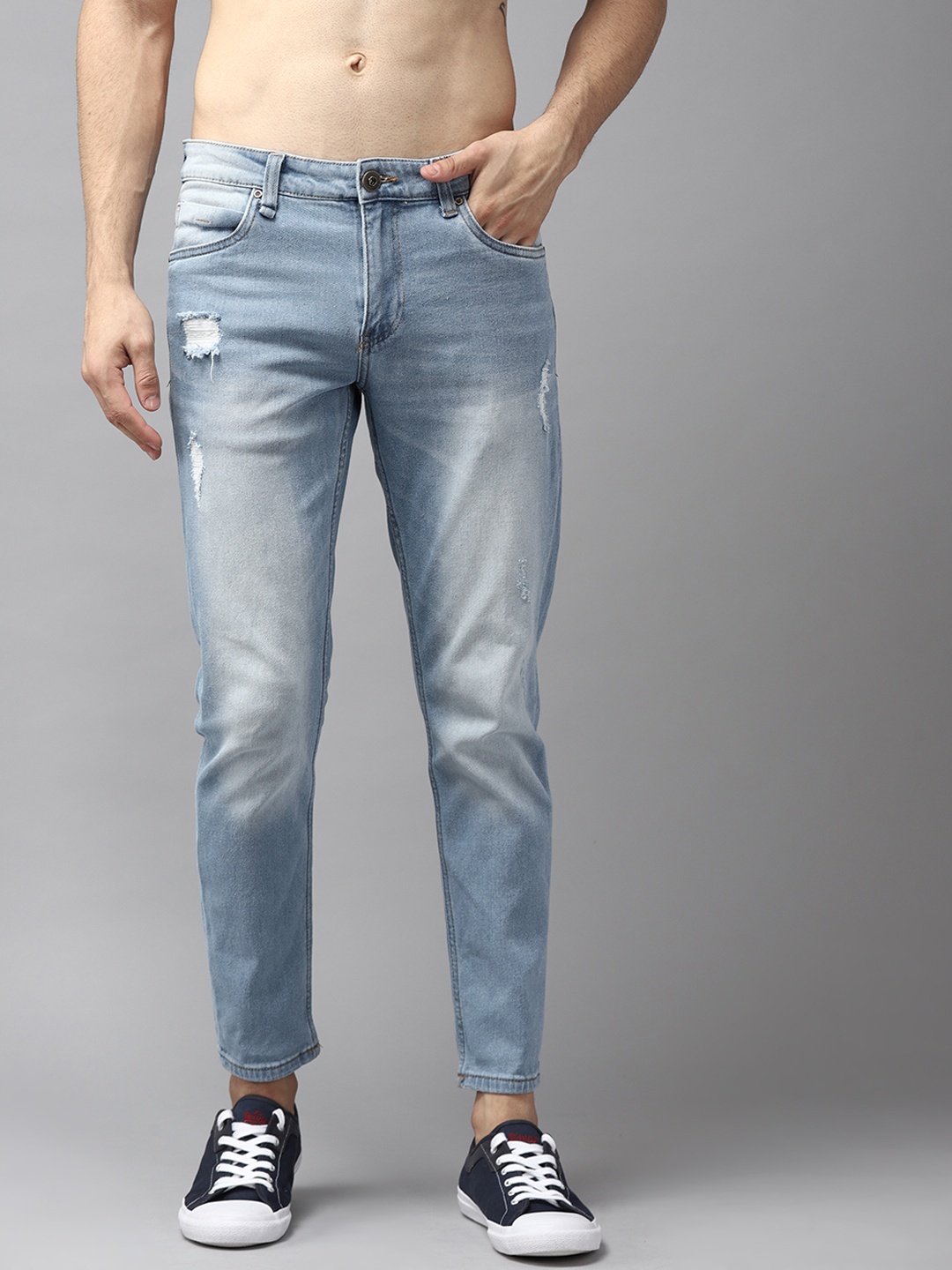 

Roadster Men Blue Mildly Distressed Carrot Fit Light Fade Cropped Jeans