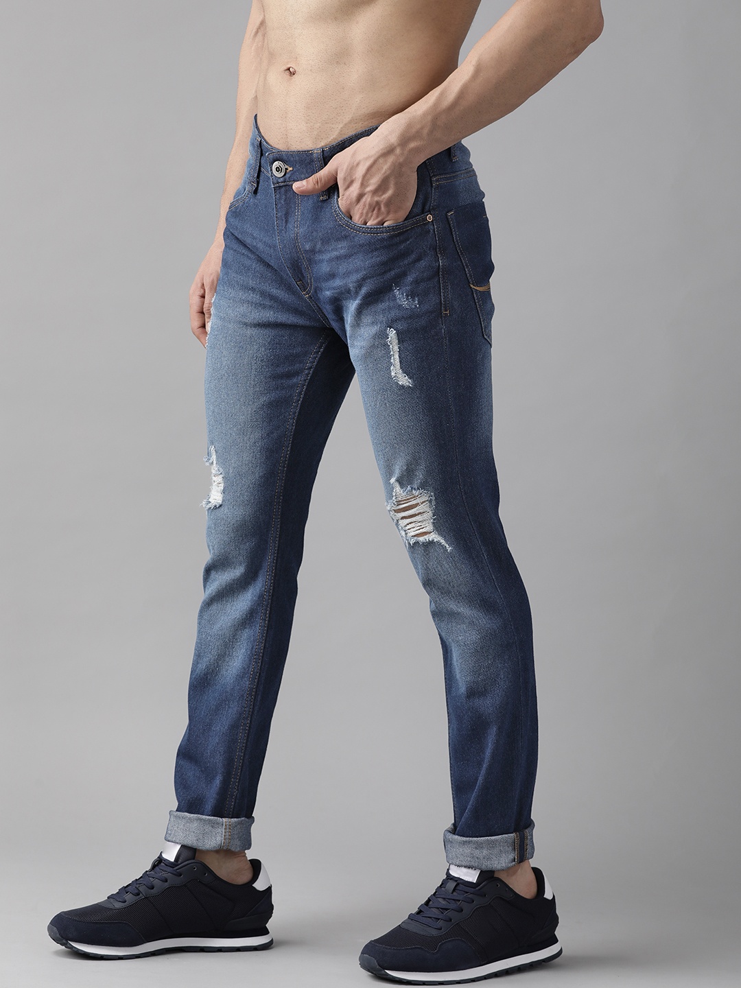 

Roadster Men Navy Blue Skinny Fit Mildly Distressed Light Fade Stretchable Jeans