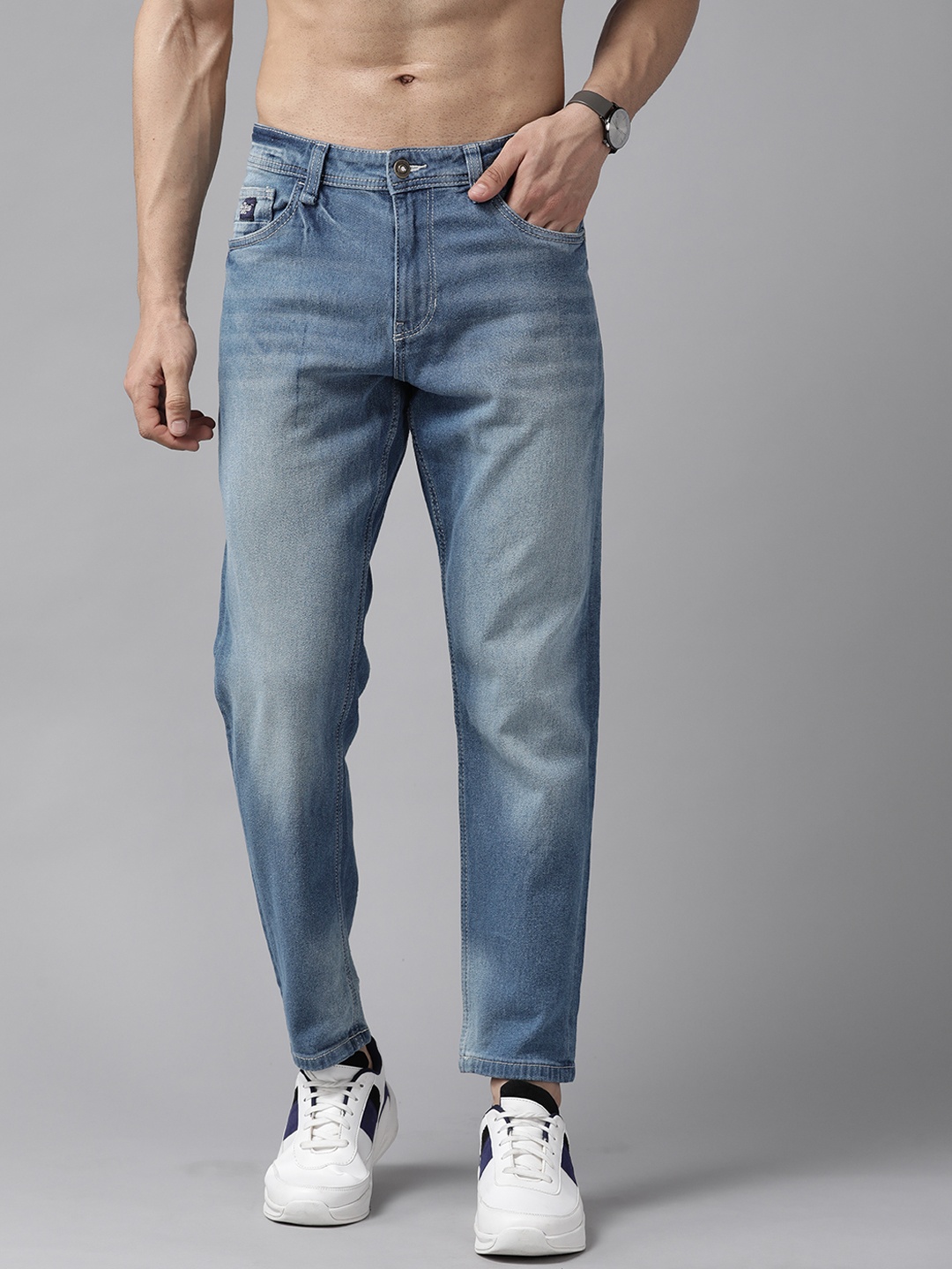 

Roadster Men Blue Carrot Fit Heavy Fade Mid-Rise Stretchable Jeans