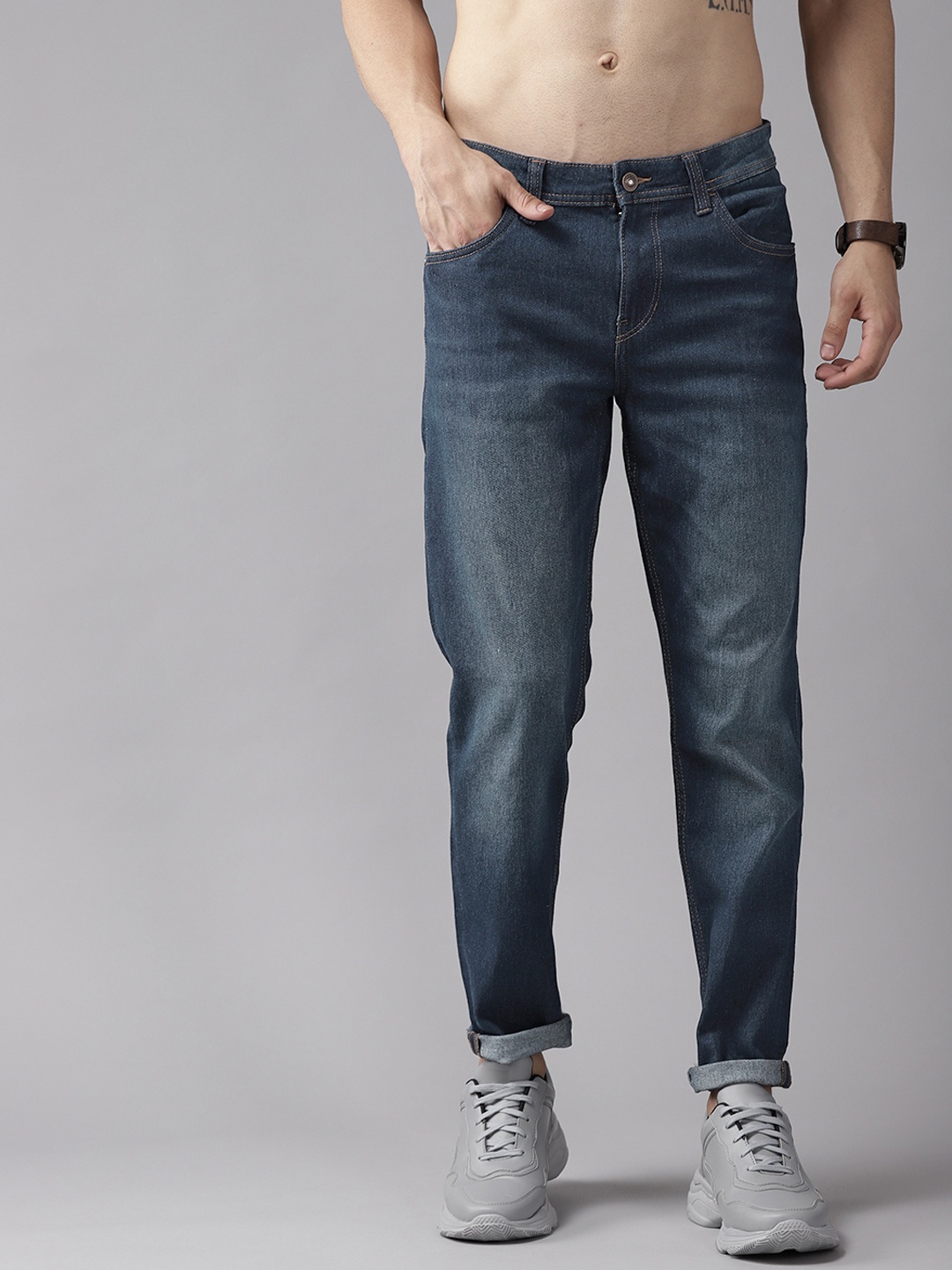 

Roadster Men Navy Blue Carrot Fit Light Fade Stretchable Jeans