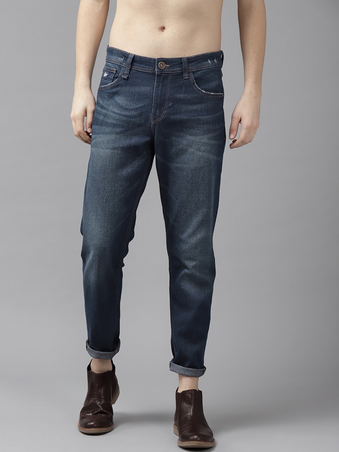

Roadster Men Navy Blue Carrot Fit Light Fade Stretchable Jeans