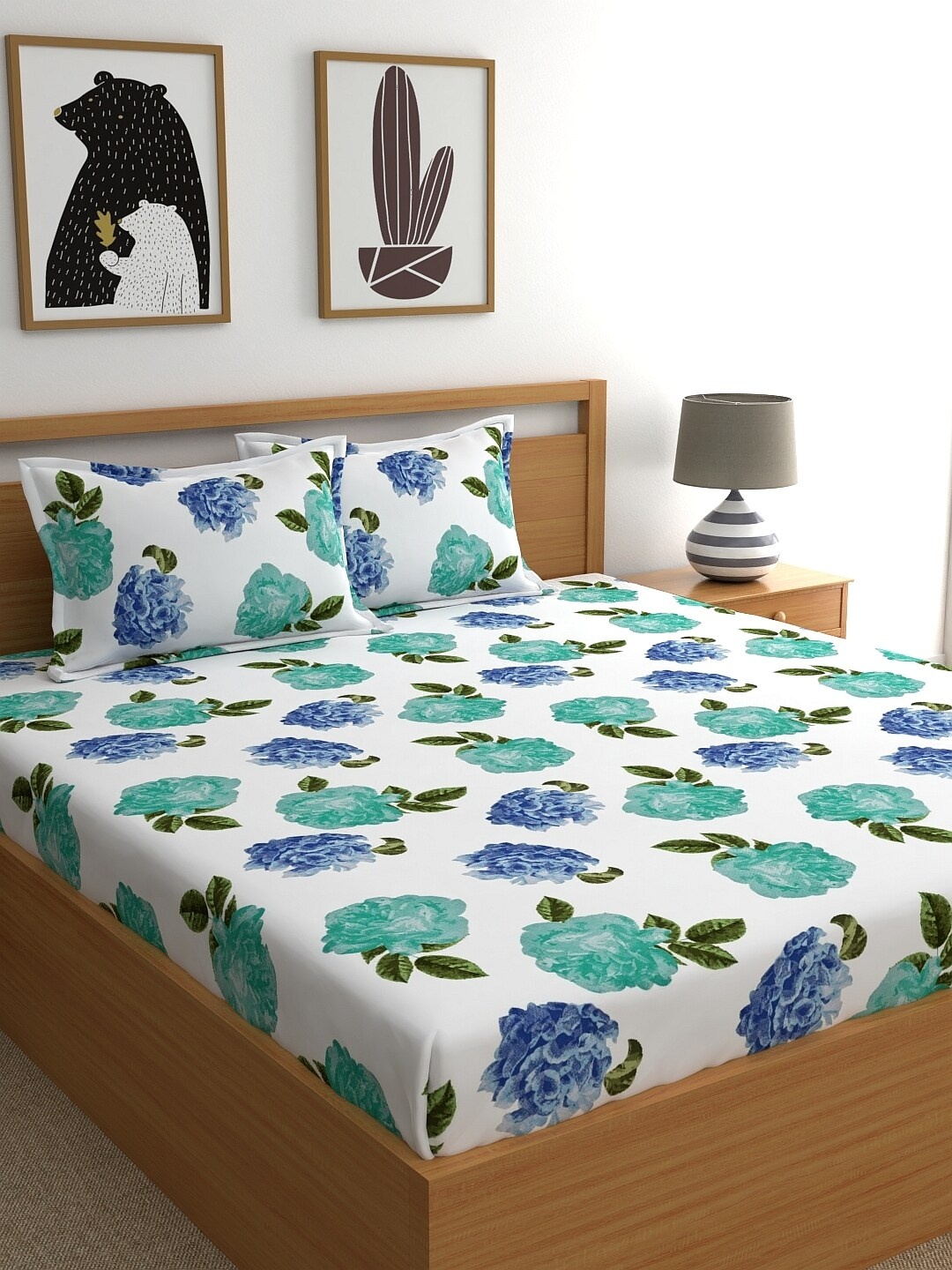 

Home Ecstasy White & Sea Green Floral 140 TC Queen Bedsheet with 2 Pillow Covers