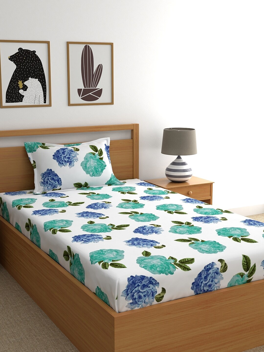 

Home Ecstasy White & Blue Floral 140 TC Single Bedsheet with 1 Pillow Covers