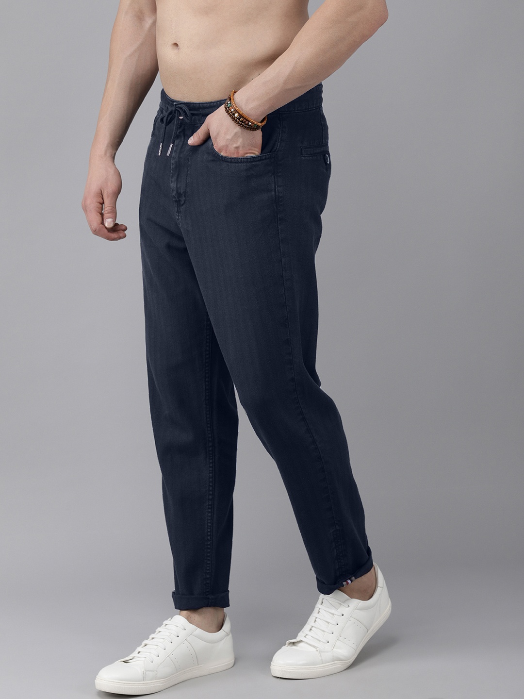

Roadster Men Navy Blue Solid Mid-Rise Regular Trousers