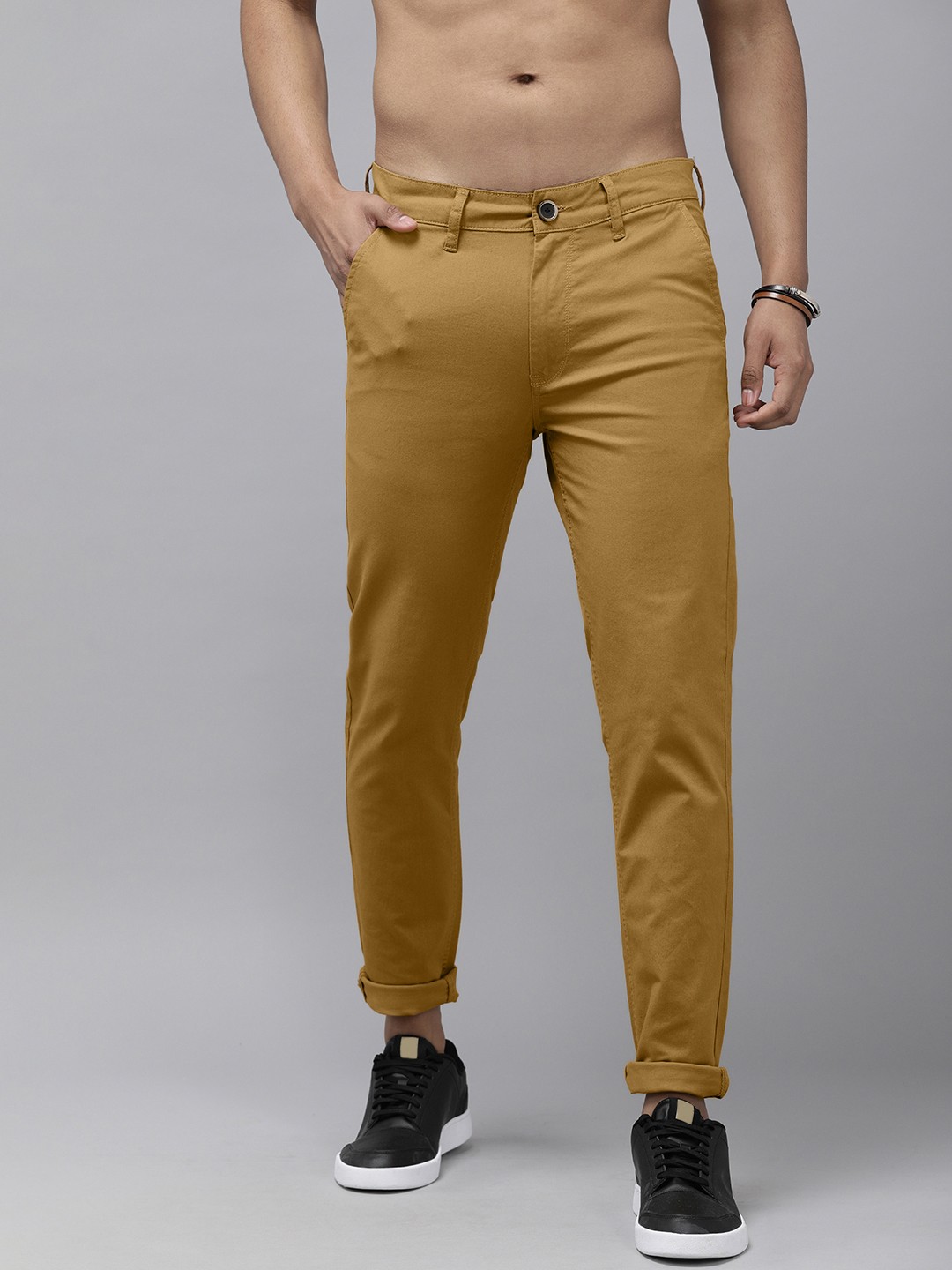 

Roadster Men Mustard Yellow Solid Opaque Slim Fit Trousers
