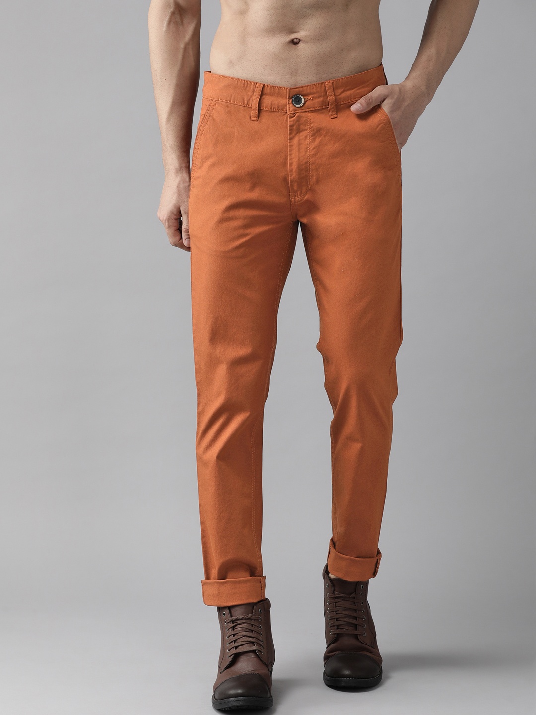 

Roadster Men Rust Orange Solid Chinos