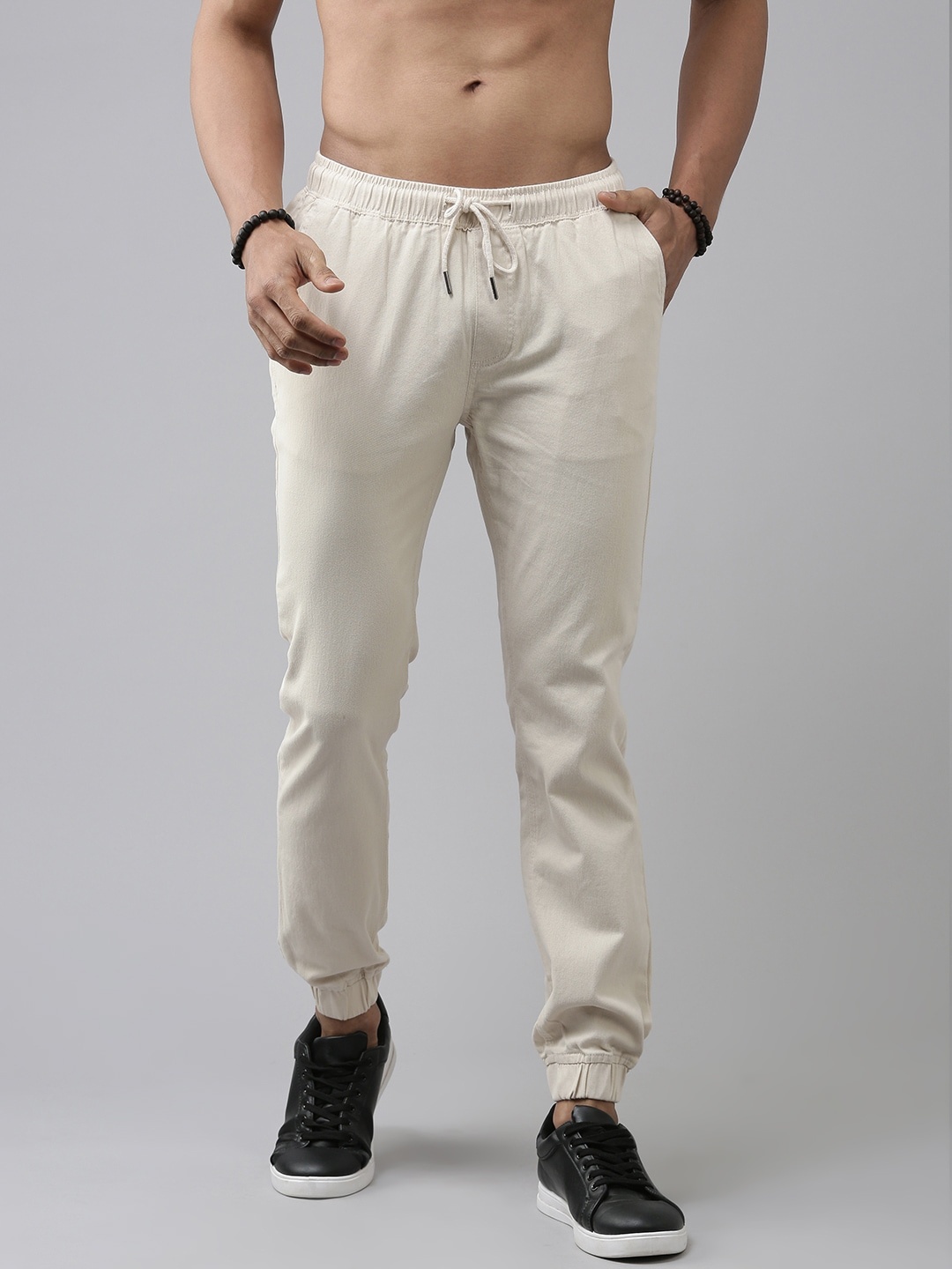 

Roadster Men Off-White Solid Jogger Trousers