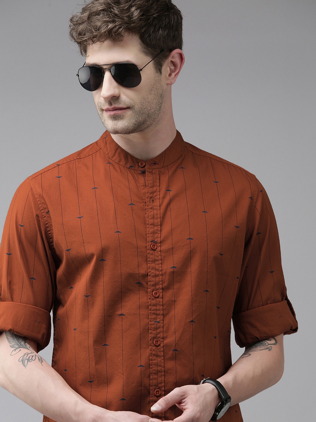 

Roadster Men Rust Orange Striped Pure Cotton Casual Shirt