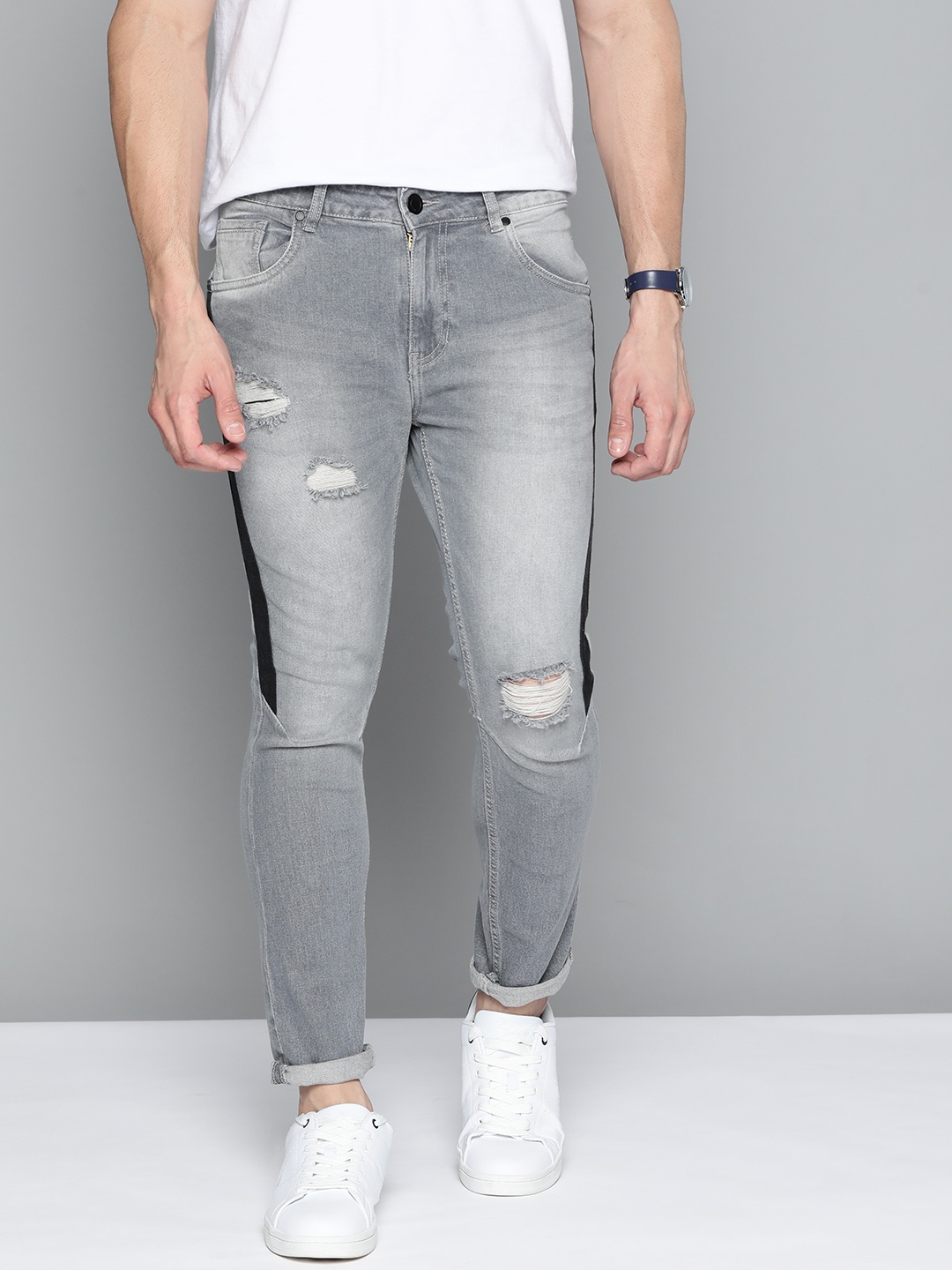 

Mast & Harbour Men Grey Skinny Fit Mildly Distressed Light Fade Stretchable Jeans